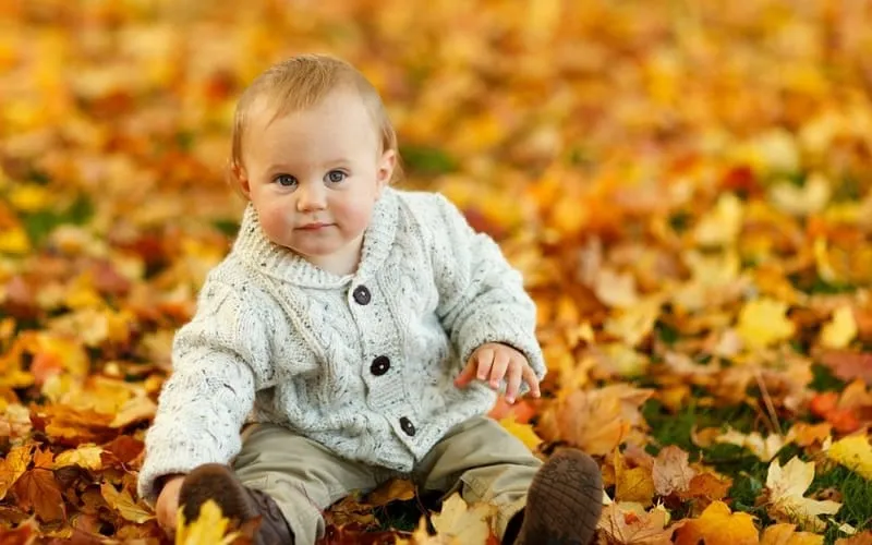 baby in leaves